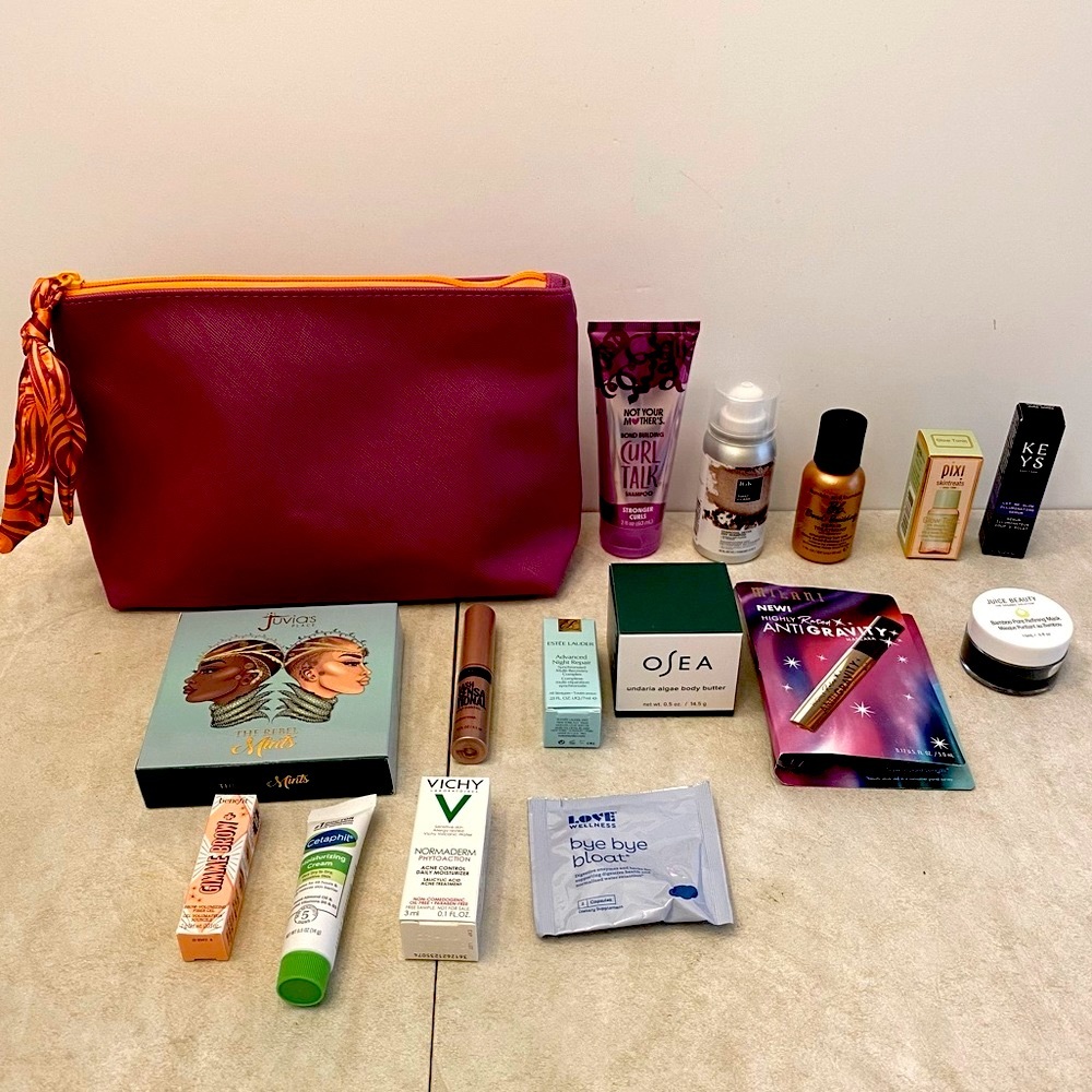 Pink and orange makeup bag with samples